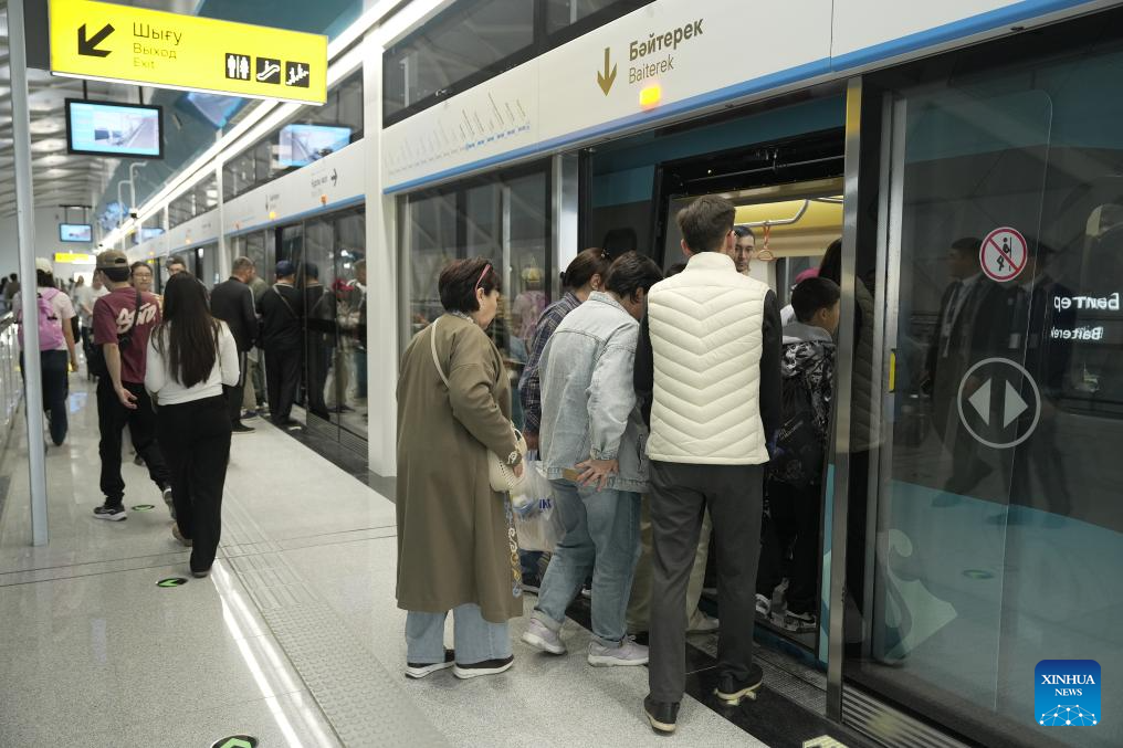 Passengers using the new light rail system