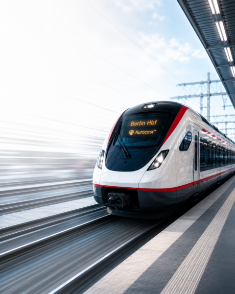 Image of the front of a train saying 'Auracast'