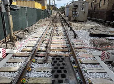 Clean ballast is installed directly onto the TrackTex