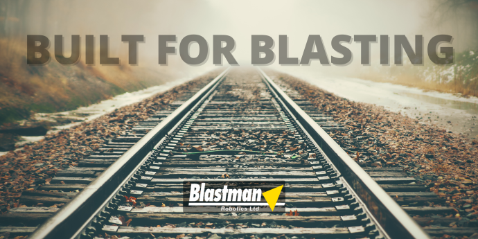 Blastman B20S robot blast cleaning a passenger coach