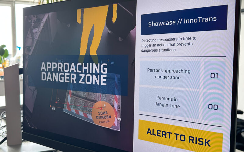AI obstacle detection system identifying a person trespassing on railway tracks as a train approaches