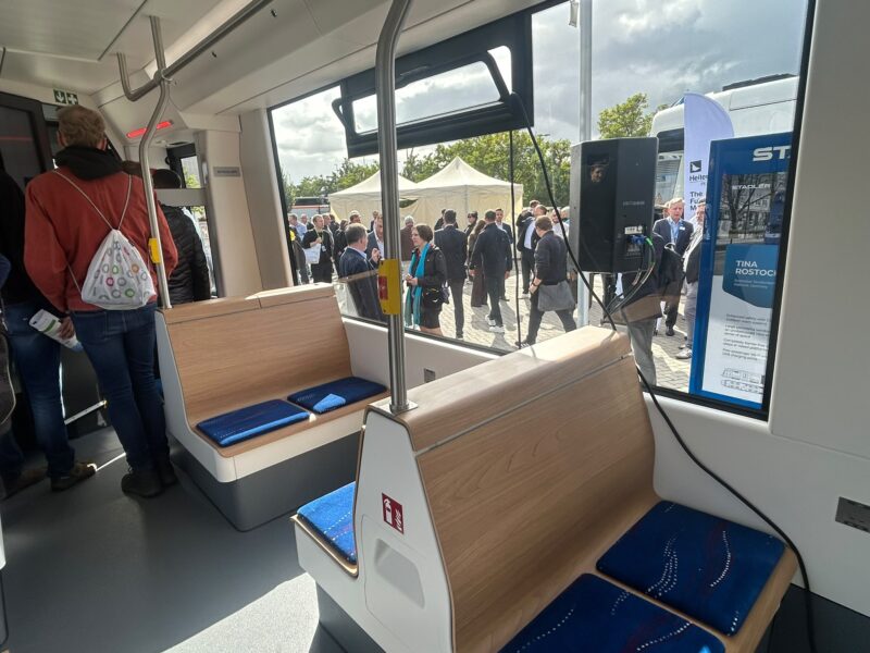 Inside the TINA tram, large panoramic windows and a clean, open layout give passengers an unobstructed view and a sense of space
