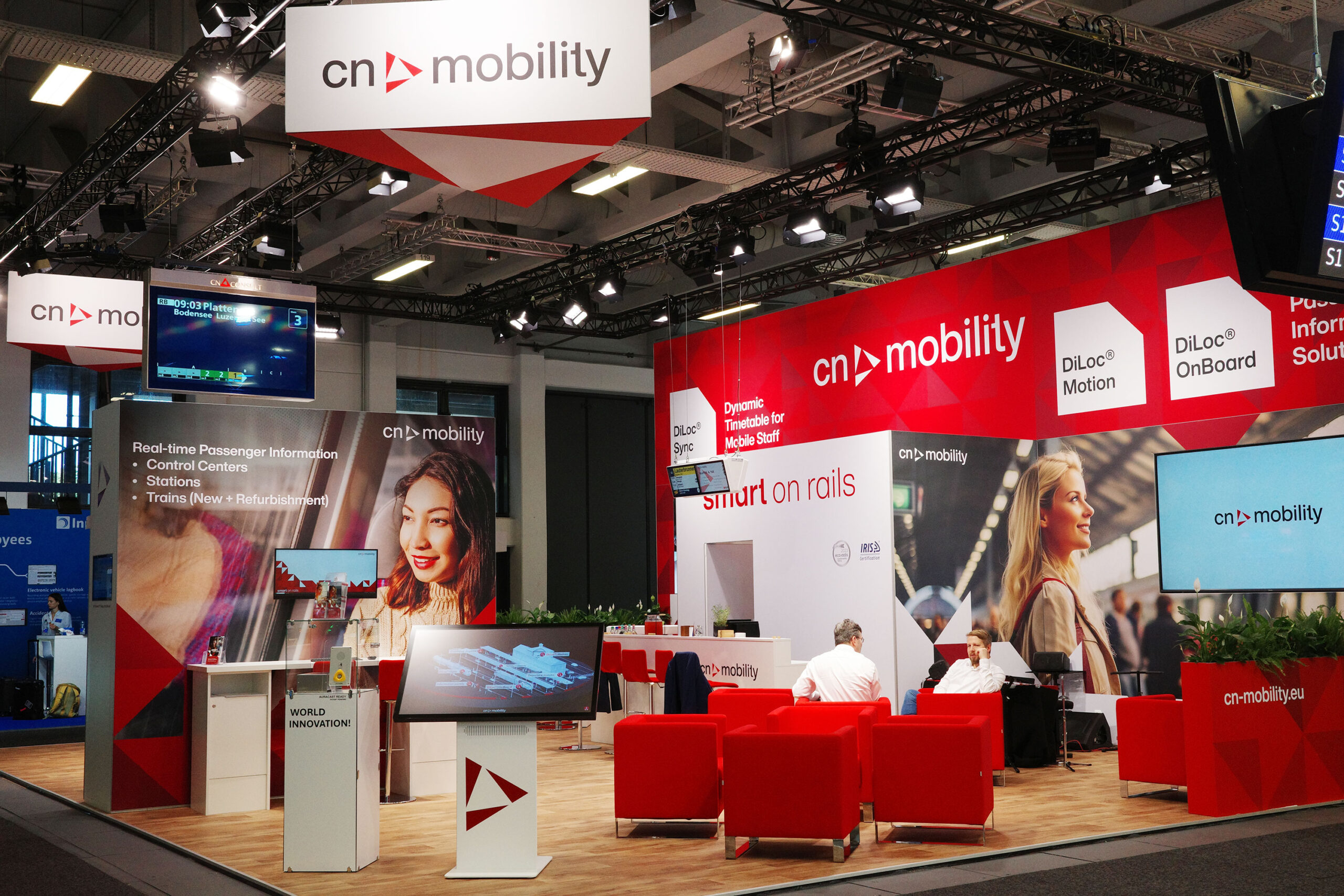 The cn-mobility exhibition stand at InnoTrans, with DiLoc Sync, DiLoc Motion and passenger information branding