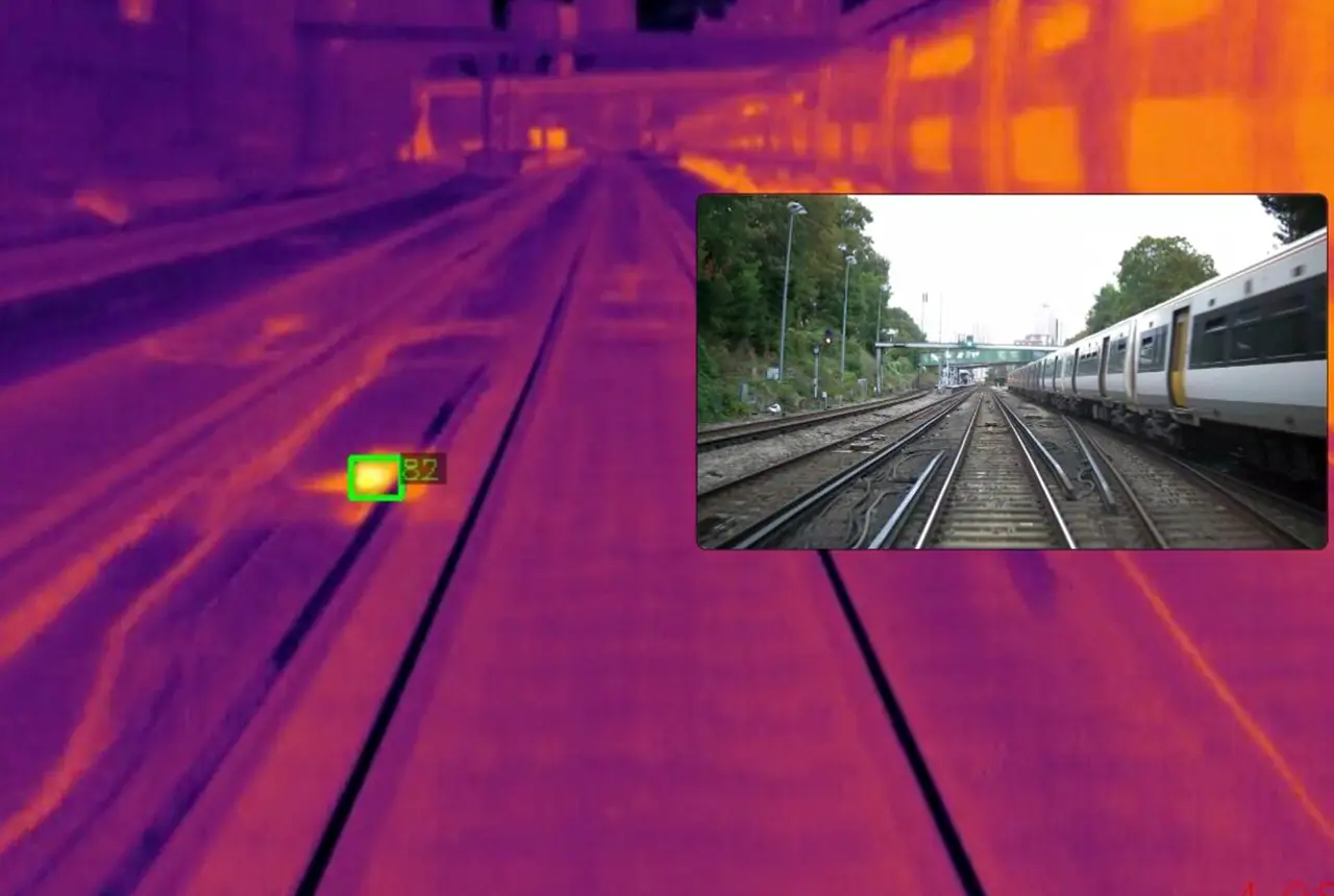 Thermal hotspot detected by an AIVR thermal camera, with an inset visible image of the track