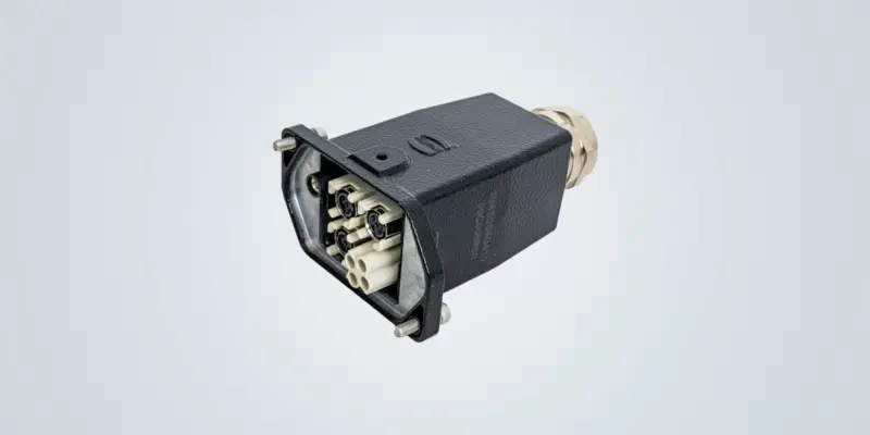 HARTING Han® 4 HPR industrial connector with a black housing, modular contact inserts and a metal cable gland